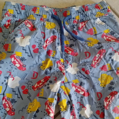 Boys' swim shorts used, size 110-116, blue with car print