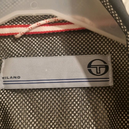 Sergio Tacchini men's sleeveless windbreaker like new, large, white