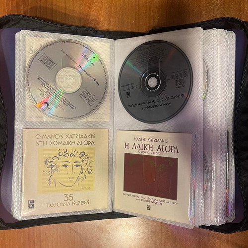 Collection of 64 CDs with carrying case, classical jazz entechno