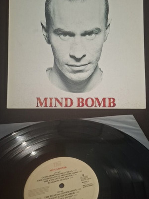 The The Mind Bomb vinyl record used with insert G1