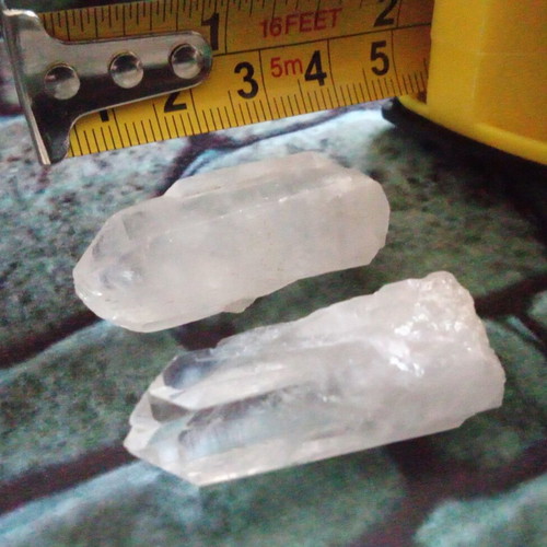 Clear quartz points set like new, two pieces