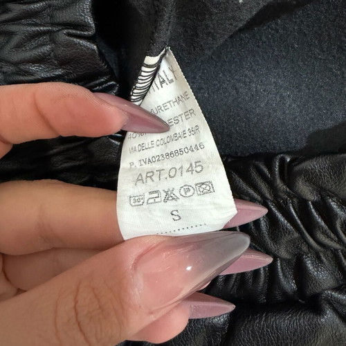 Women's black leather balloon or jogger pants used, with elastic waist and cuffs