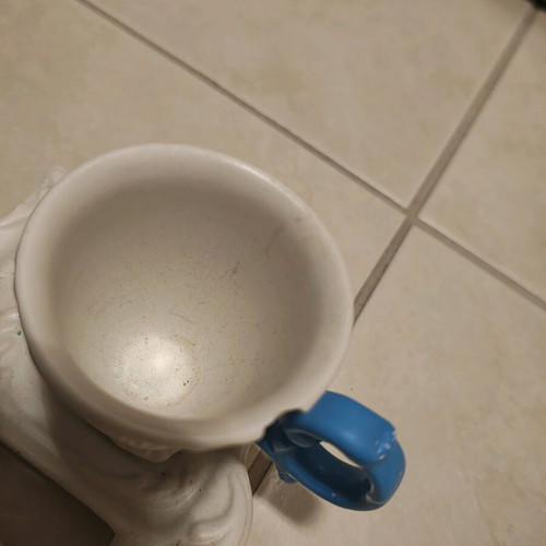 Porcelain glasses used, one slightly broken