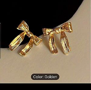 Σκουλαρίκια Σε Χρυσό Χρώμα σε Σχήμα Φιόγκο.
