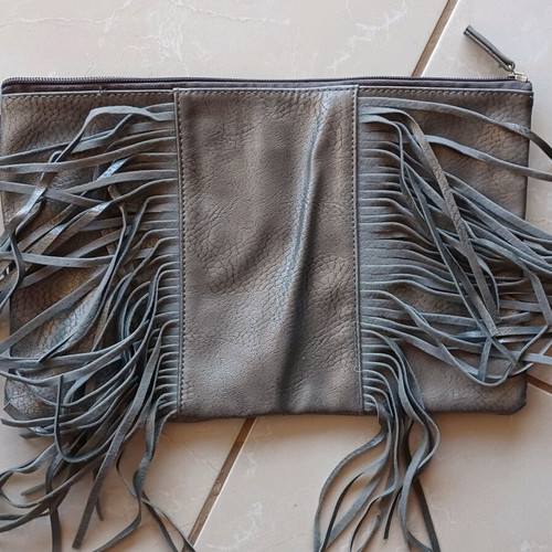 Grey faux leather fringe clutch bag like new