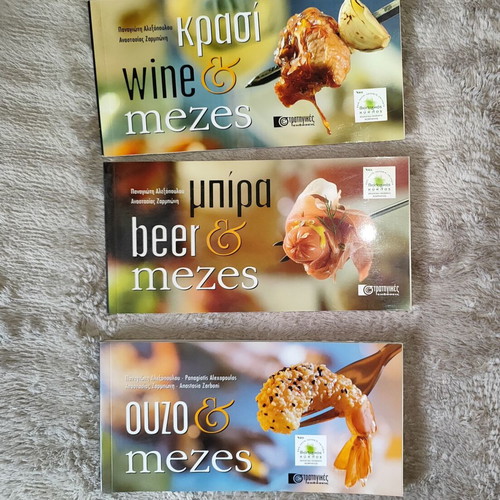 Set of 3 bilingual cookbooks like new, mezes for wine, beer & ouzo
