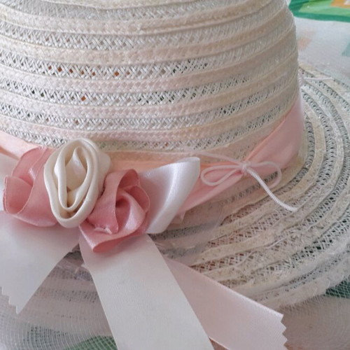 White hat with pink flowers and ribbon like new