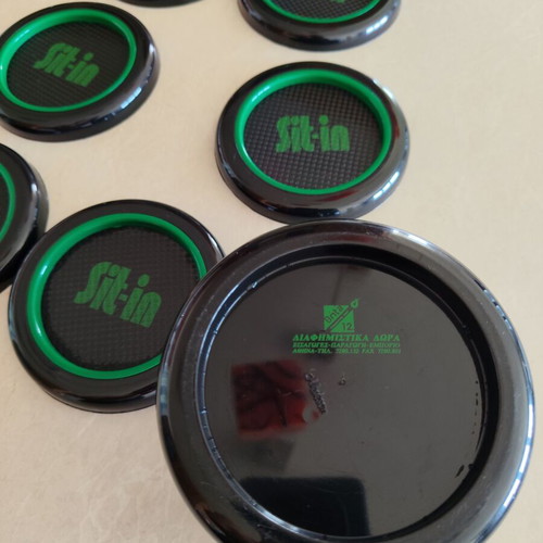 Coaster set of six plastic pieces with holder, like new