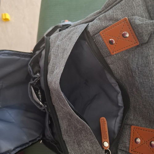 Baby backpack like new with multiple compartments and three insulated bottle holders