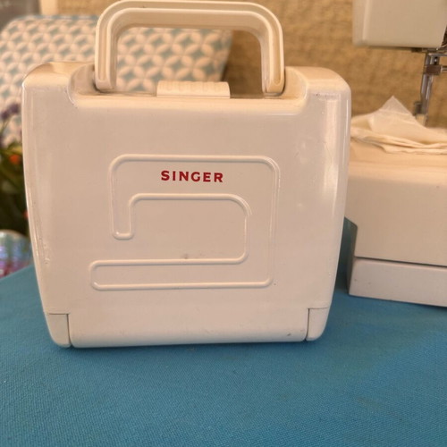 Sewing machine like new with accessories and carrying case