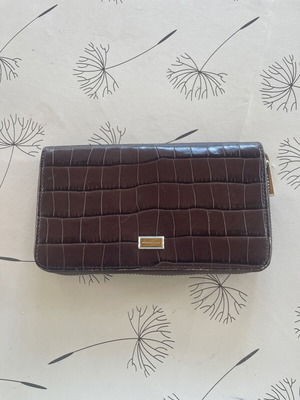 Coccinelle wallet used, burgundy color