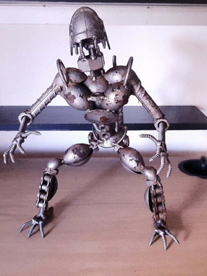 Alien used metallic handmade figure with accessories