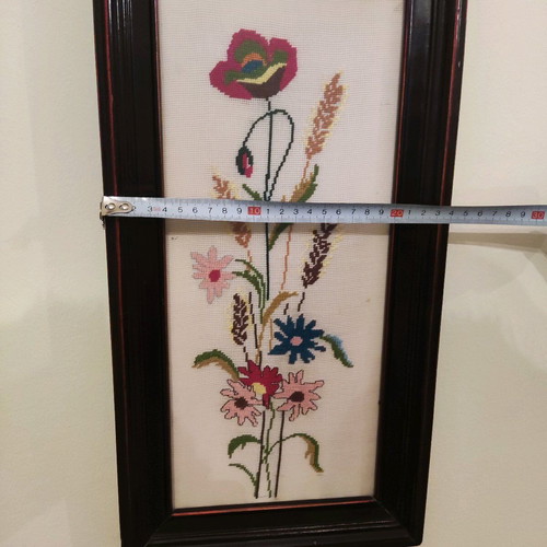 Decorative textile painting with handmade embroidery used, flowers