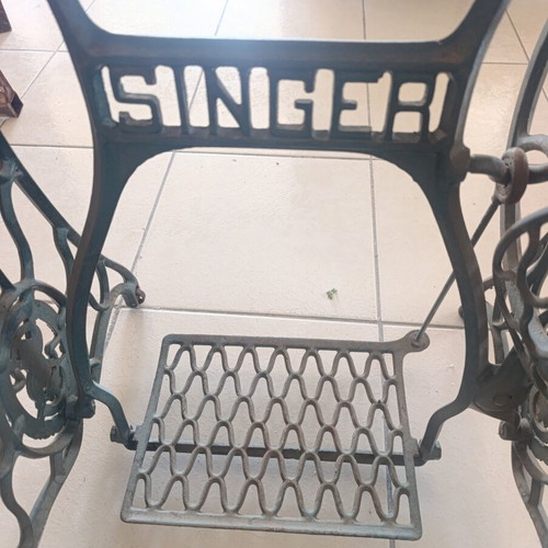 Vintage table console with Singer cast iron base and marble top used