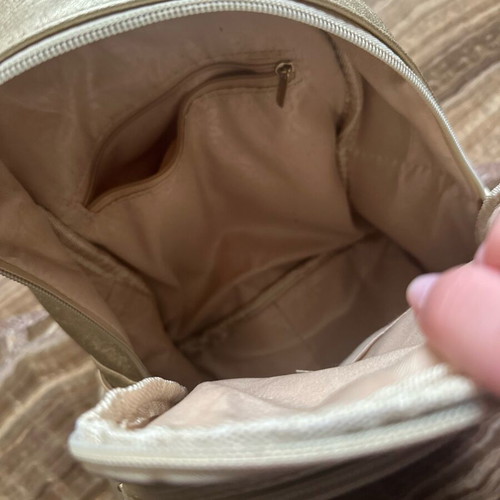 Backpack like new, gold color