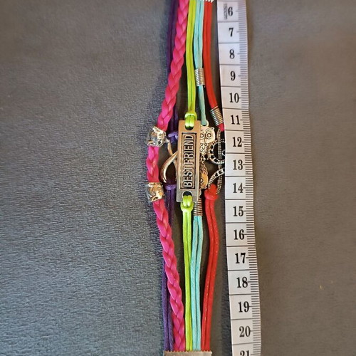 Best Friends bracelet new with multiple layers of leatherette and colorful cords