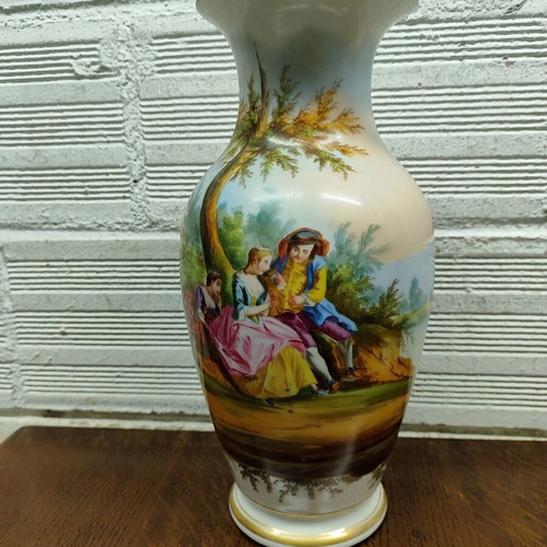 Old porcelain vase used, hand-painted with romantic scene