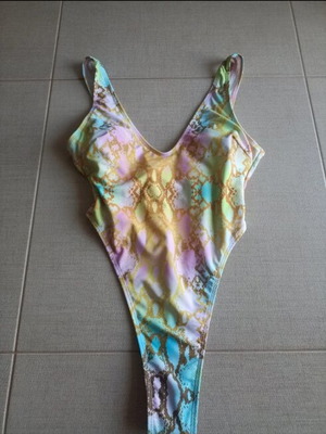 One-piece swimsuit new, colorful, cut back, size Small