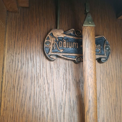 Wooden Radium wall clock used with vintage pendulum