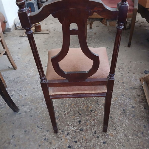 Vintage wooden chair used with brown velvet upholstery
