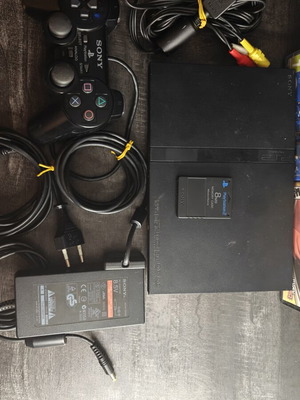 PlayStation 2 Slim console bundle with 2 games