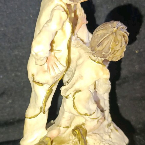 Vintage decorative figurine with children, used