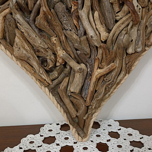 Handmade decorative heart with driftwood