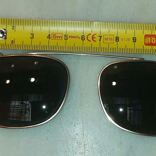 Clip On Sunglasses like new, gold color, no name