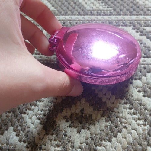 Small mirror with comb used
