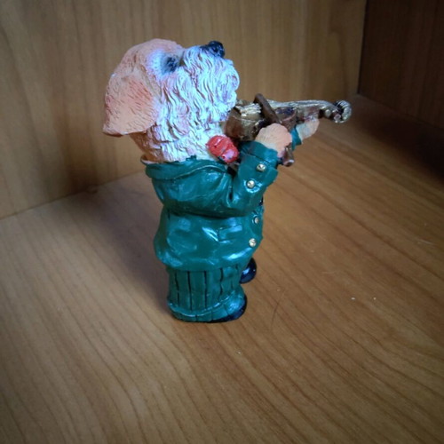 Decorative dog figure with violin like new