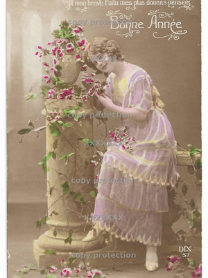 Hand-colored vintage postcard with young woman, used, 1910