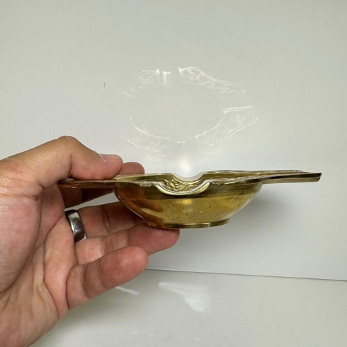Vintage handmade brass ashtray with floral engravings