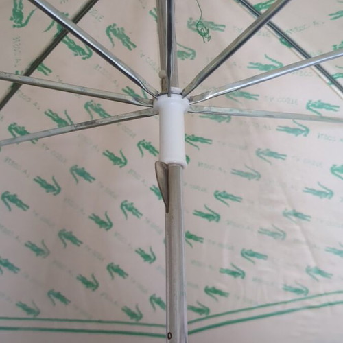 Lacoste vintage umbrella used with collectible Minnie Mouse
