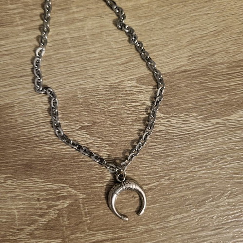 Embossed crescent moon necklace used, silver brass