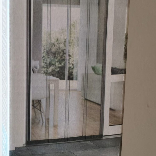 Door screen new with strips and adhesive base