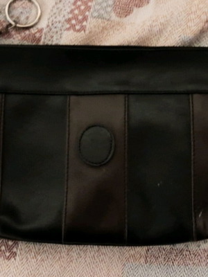 Leather toiletry bag used, black and brown