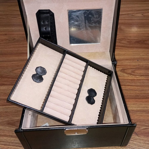 Vintage black jewelry box used with mirror and beige lining