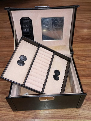 Vintage black jewelry box used with mirror and beige lining