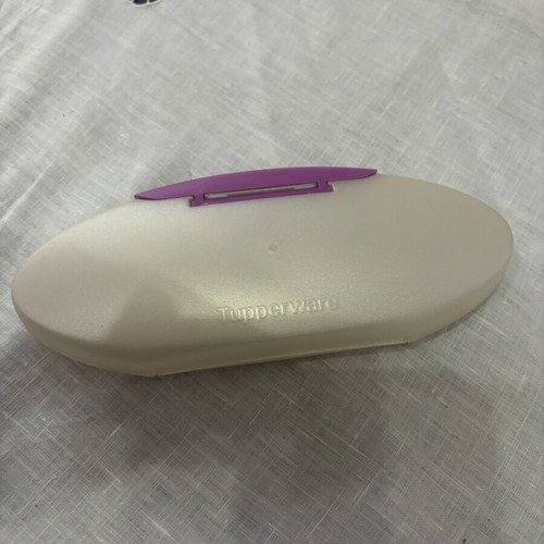 Tupperware glasses case used