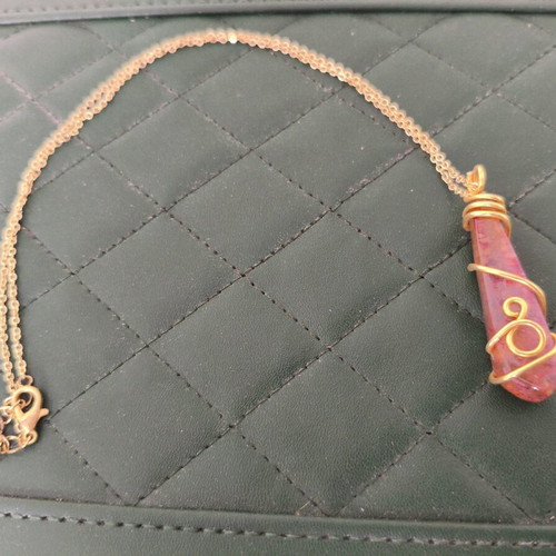 Necklace with pink stone pendant like new, faux gold