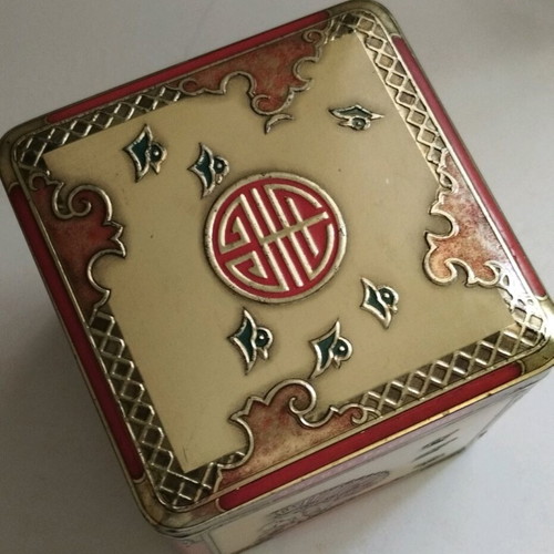 Niemeyer vintage tea tin used, embossed scenes, tin material