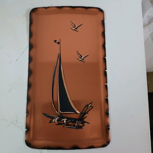 Copper frame with ship depiction like new