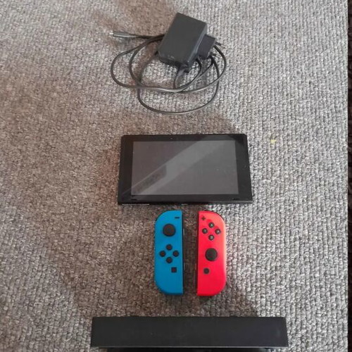 Nintendo Switch 128 GB like new with dock, charger and games