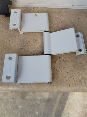 Aluminum hinges like new, 20 large and 23 small with screws and plastic