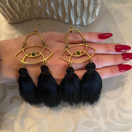 Dangling earrings with black tassels and gold details like new