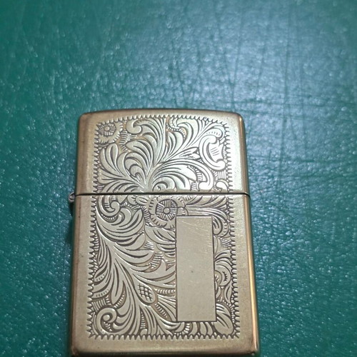 Vintage ZIPPO lighter in gold color, Venetian filigree design