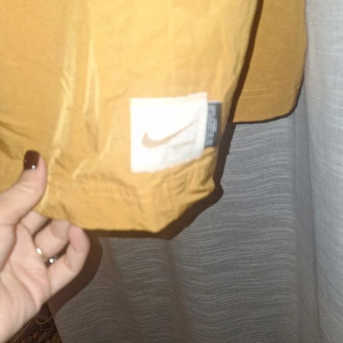 Nike jumpsuit like new, yellow, size XS