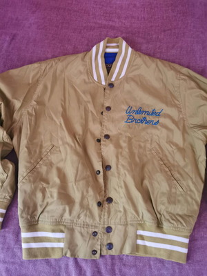 Unlimited spring jacket size M like new, gold color
