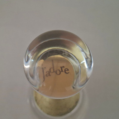 Roberto Cavalli Oro and Christian Dior J'adore empty perfume bottles