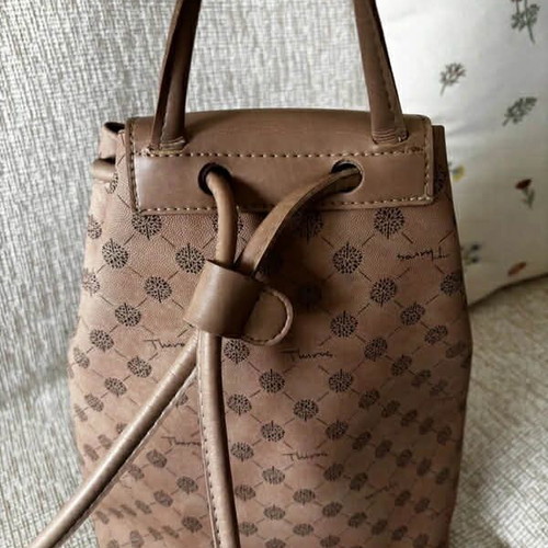 Thiros backpack used, nude with signature design